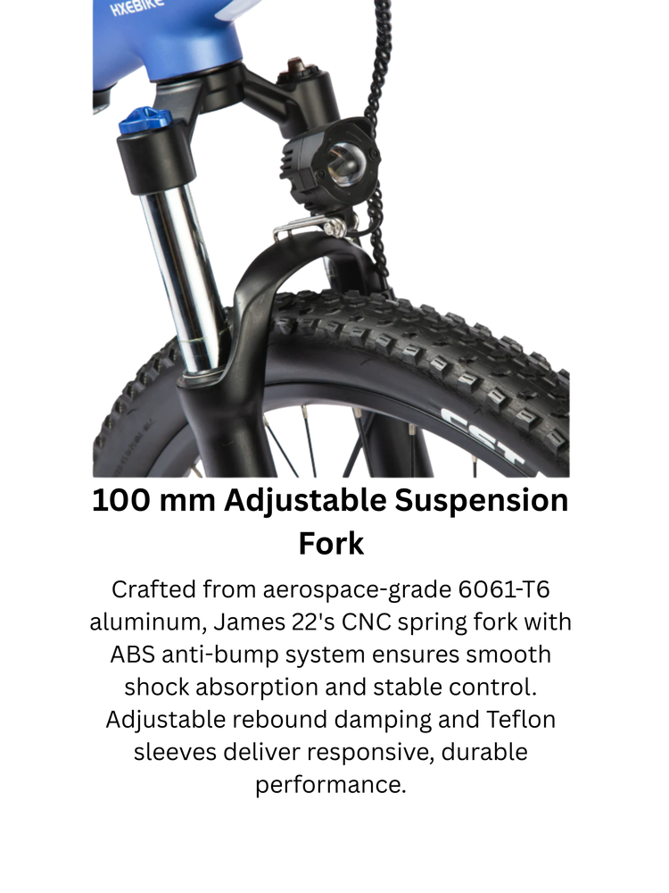 Close-up of a mountain bike's adjustable suspension fork with thick tire.